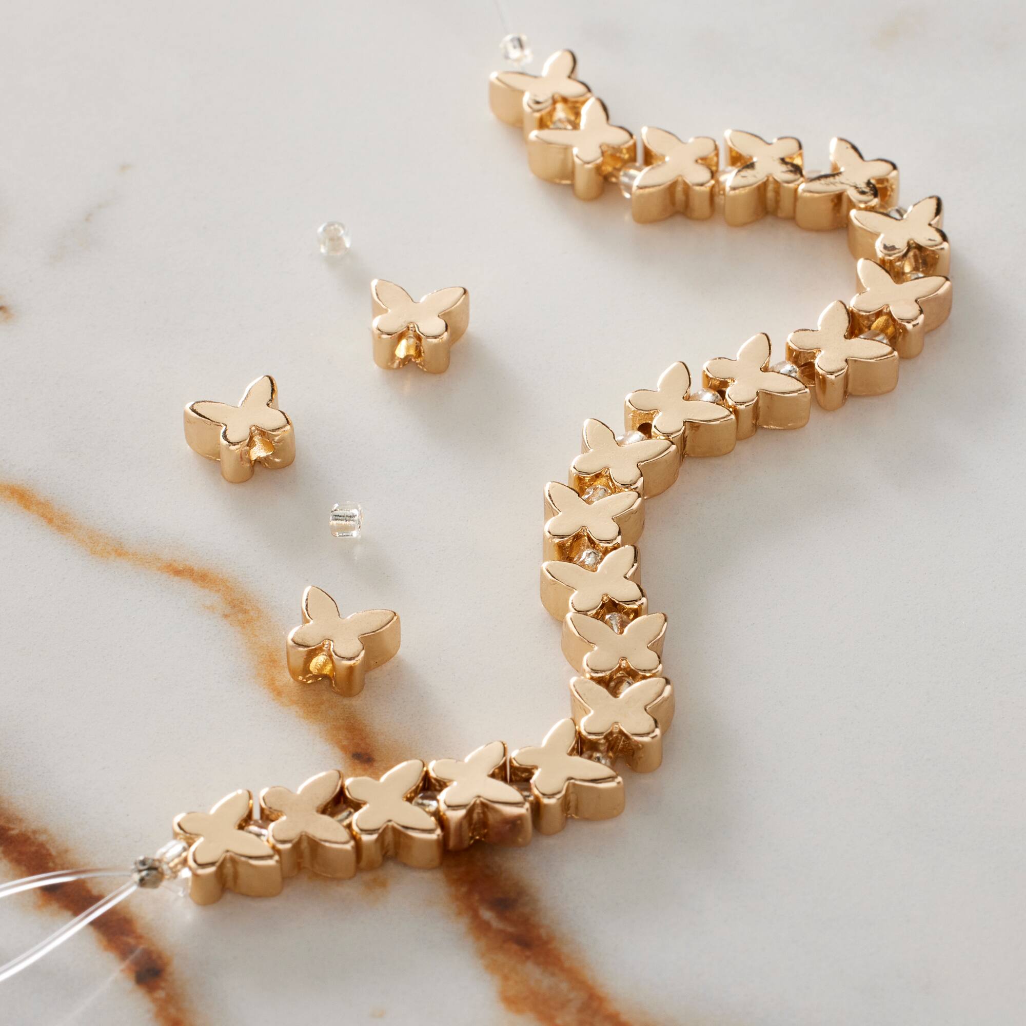Gold Butterfly Beads, 6mm by Bead Landing™
